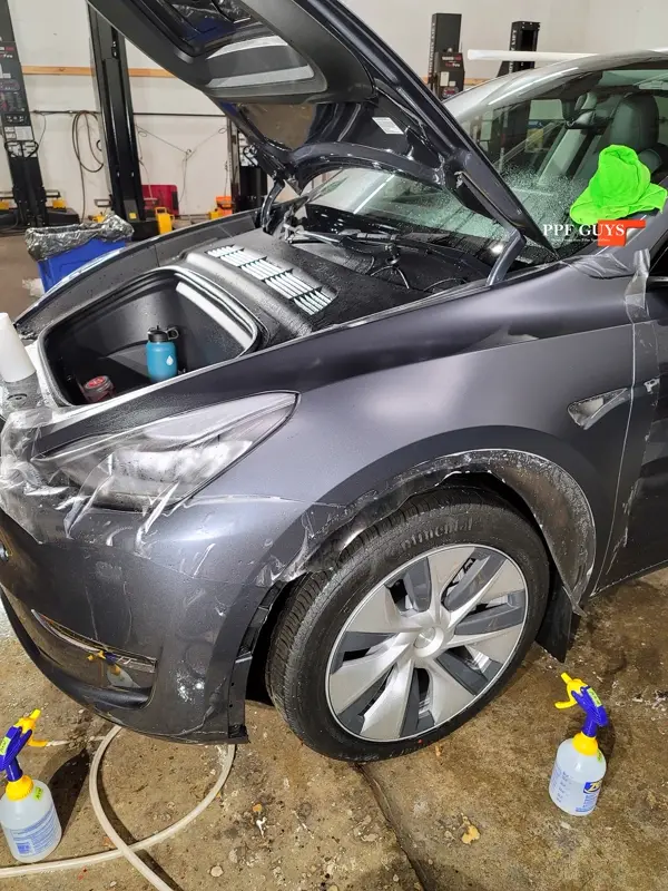 Silver Tesla Model Y, Stealth. Photo 24 of 29.