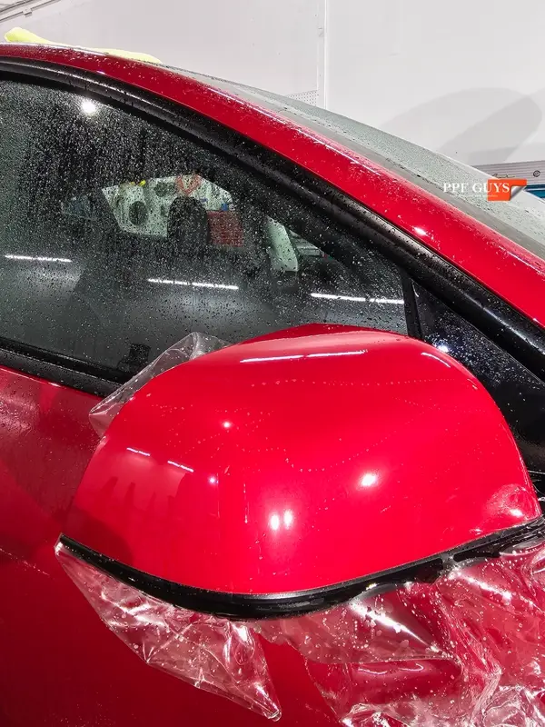 Red Tesla Model 3, Front end, partial A-pillars and rockers. Photo 23 of 30.