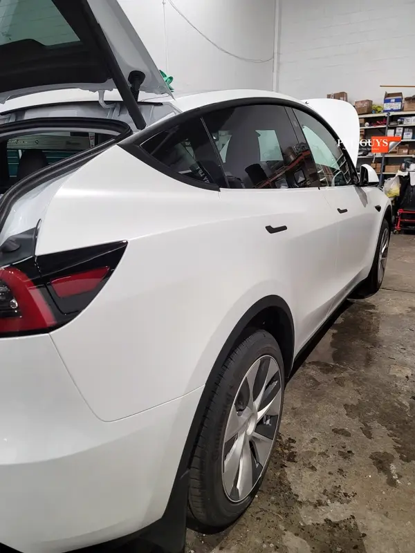 White Tesla Model Y, Stealth. Photo 33 of 42.