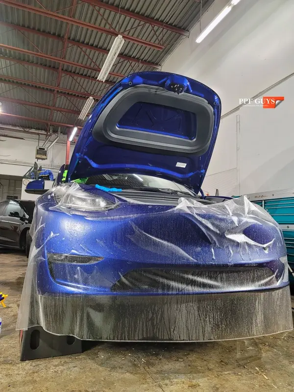 Blue Tesla Model Y, Stealth PPF. Photo 18 of 20.