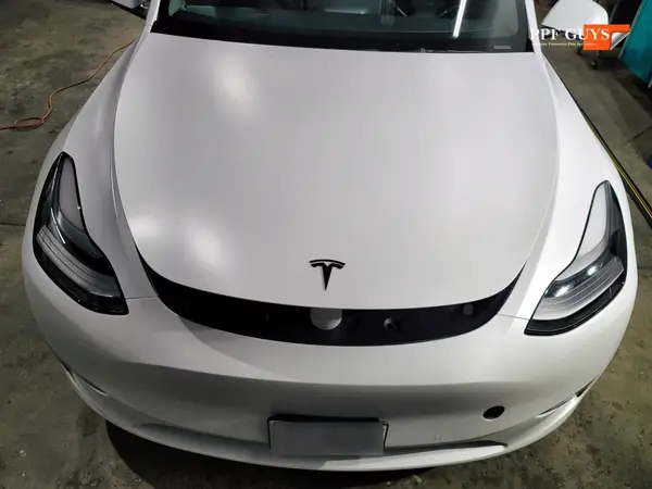 White Tesla Model Y, XPEL Stealth, ceramic, painted emblems. Photo 22 of 34.