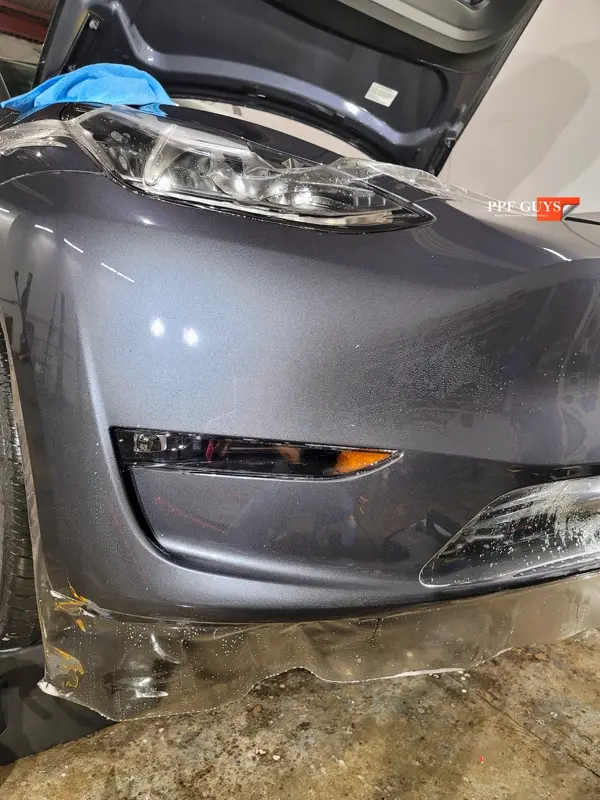 Silver Tesla Model Y, PPF. Photo 20 of 25.