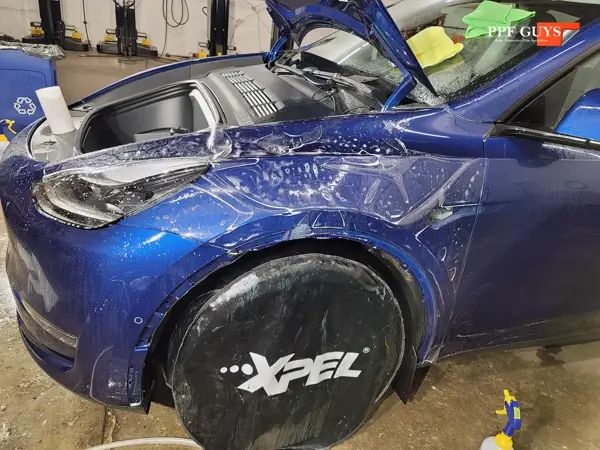 Blue Tesla Model Y, Full body PPF, XPEL Ultimate Plus. Photo 15 of 20.