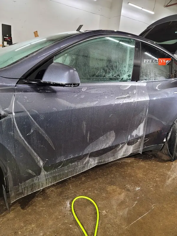Silver Tesla Model Y, Stealth. Photo 13 of 29.