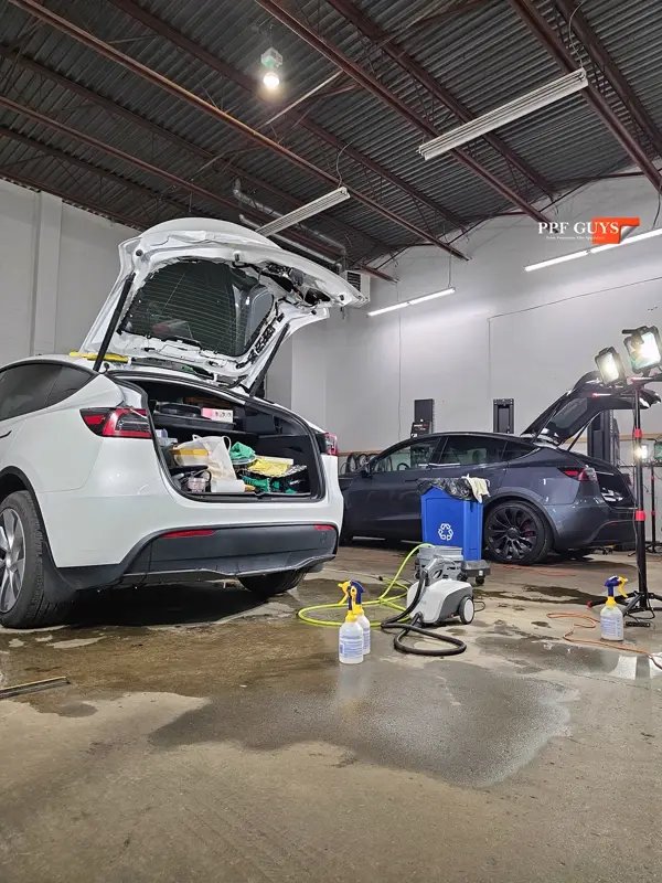 Silver Tesla Model Y, Full body Ultimate Fusion, blacked out emblems. Photo 15 of 45.