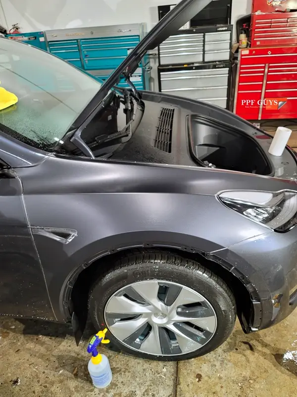 Silver Tesla Model Y, Stealth. Photo 26 of 29.