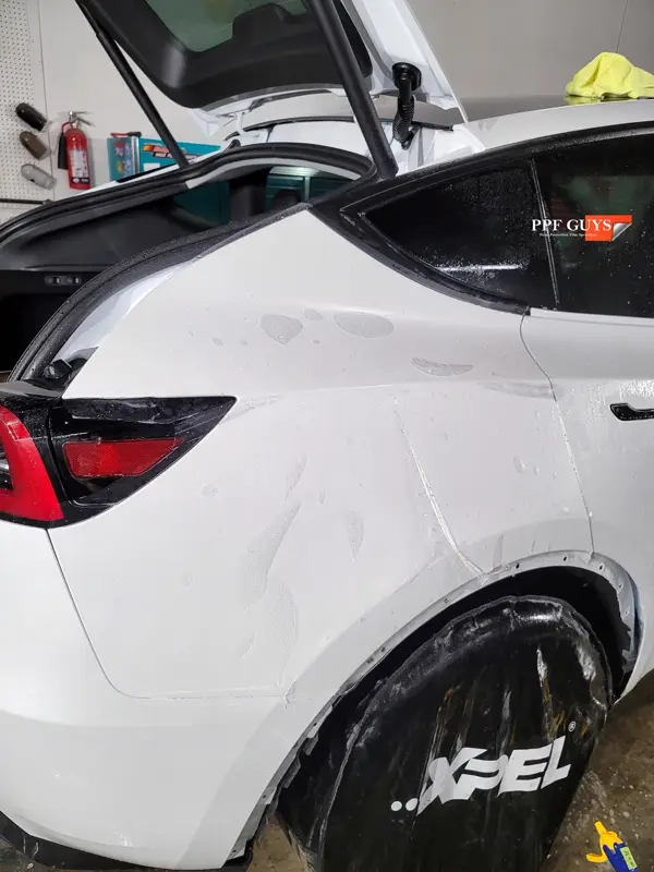 White Tesla Model Y, Full body XPEL Stealth satin finish PPF. Photo 23 of 54.
