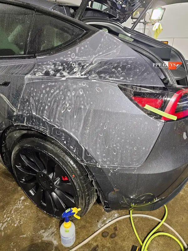 Silver Tesla Model Y, Full body Ultimate Fusion, blacked out emblems. Photo 31 of 45.