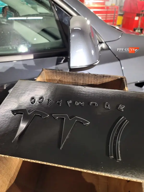 Silver Tesla Model Y, Full body Ultimate Fusion, blacked out emblems. Photo 45 of 45.
