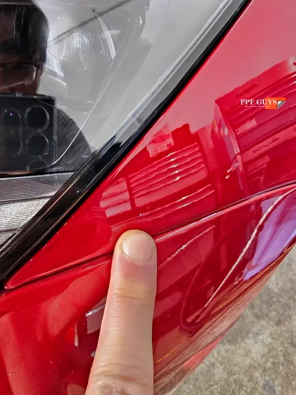 Red Tesla Model 3, Front end, partial A-pillars and rockers. Photo 26 of 30.