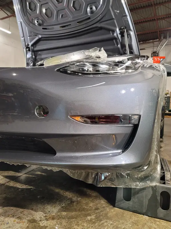 Silver Tesla Model 3, Front end and rear fenders. Photo 16 of 16.