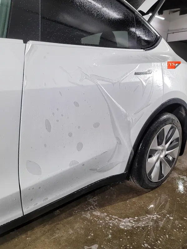 White Tesla Model Y, Stealth. Photo 11 of 42.