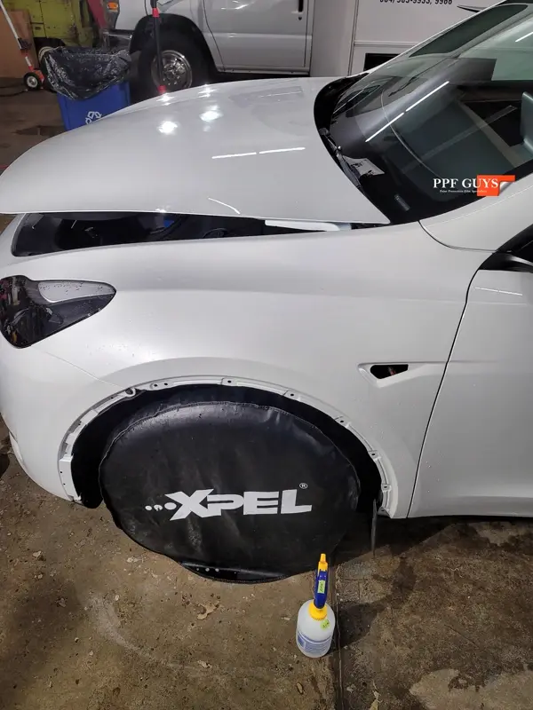 White Tesla Model Y, Stealth. Photo 39 of 42.