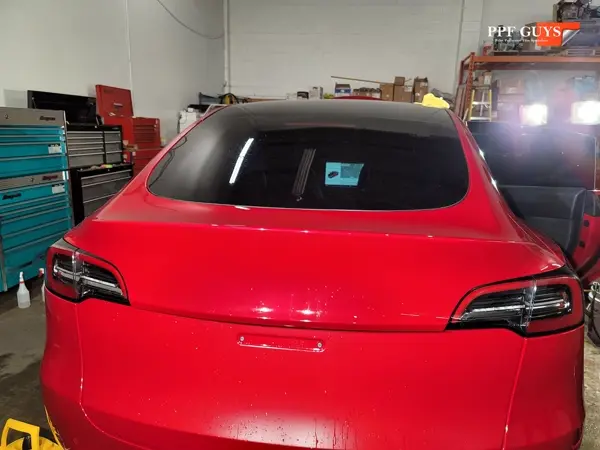 Red Tesla Model Y, Stealth. Photo 10 of 48.