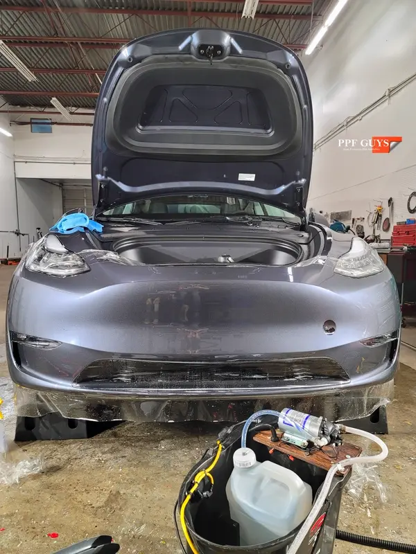Silver Tesla Model Y, PPF. Photo 19 of 25.