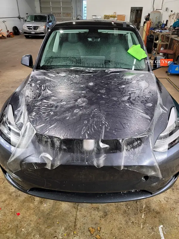 Silver Tesla Model Y, Stealth