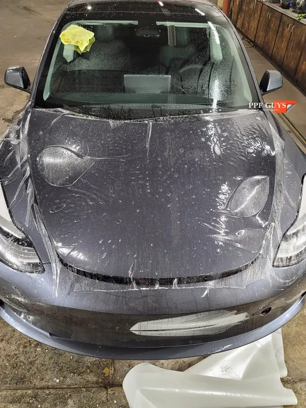 Silver Tesla Model 3, Front end and rear fenders