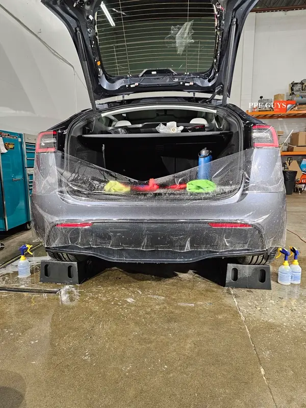 Silver Tesla Model Y, Full body Ultimate Fusion, blacked out emblems. Photo 34 of 45.
