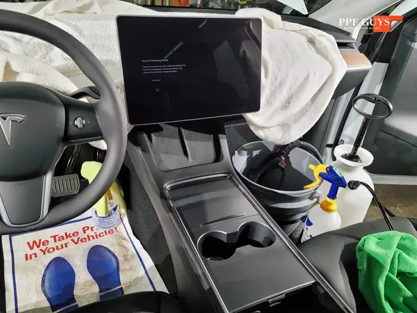 White Tesla Model Y, XPEL Stealth, ceramic, painted emblems. Photo 17 of 34.