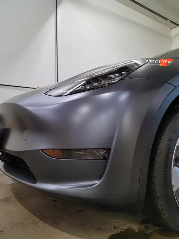 Silver Tesla Model Y, Stealth. Photo 21 of 29.