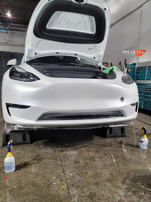 White Tesla Model Y, Stealth. Photo 12 of 42.