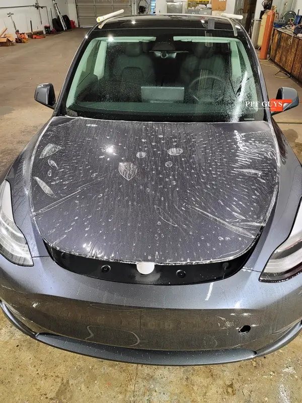 Silver Tesla Model Y, PPF. Photo 10 of 25.