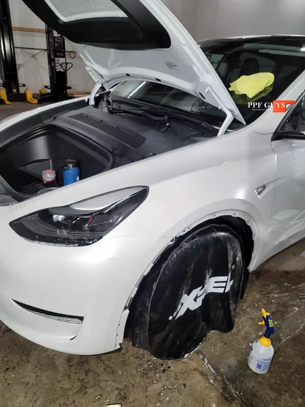 White Tesla Model Y, Full body XPEL Stealth satin finish PPF. Photo 9 of 54.