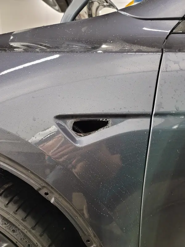 Silver Tesla Model Y, Full body Ultimate Fusion, blacked out emblems. Photo 44 of 45.