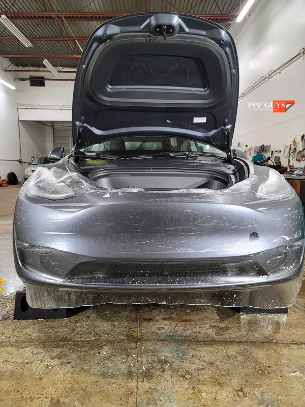 Silver Tesla Model Y, Stealth. Photo 28 of 29.